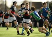 25 January 2016; Sean Óg Barnes, High School, is tackled by Flynn Donnelly, Gorey Community School. Bank of Ireland Schools Fr. Godfrey Cup, Semi-Final, High School v Gorey Community School. Castle Avenue, Clontarf, Dublin. Picture credit: Sam Barnes / SPORTSFILE