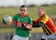 8 November 2009; Peter O'Dwyer, Kilmurray Ibrickane, in action against Pat Donnelly, Dromcollogher-Broadford. AIB GAA Football Munster Senior Club Championship Quarter-Final, Dromcollogher-Broadford v Kilmurray Ibrickane, Quilty, Co. Clare. Picture credit: Diarmuid Greene / SPORTSFILE