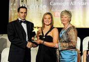 7 November 2009; Chloe Morey, Clare, is presented with her Munster Young Player of the Year award by Paul Brady, three times World Handball Champion, and Joan O'Flynn, President of the Camogie Association, during the 2009 Camogie All-Stars Awards, in association with O'Neills. Citywest Hotel, Conference, Leisure & Golf Resort, Dublin. Picture credit: Pat Murphy / SPORTSFILE