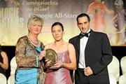 7 November 2009; Fiona Stephens, Offaly, is presented with her Camogie Soaring Star award by Joan O'Flynn, President of the Camogie Association, and Paul Brady, three times World Handball Champion, during the 2009 Camogie Soaring Star Awards, in association with O'Neills. Citywest Hotel, Conference, Leisure & Golf Resort, Dublin. Picture credit: Pat Murphy / SPORTSFILE