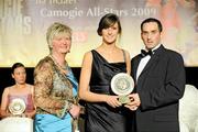 7 November 2009; Michaela Morkan, Offaly, is presented with her Camogie Soaring Star award by Joan O'Flynn, President of the Camogie Association, and Paul Brady, three times World Handball Champion, during the 2009 Camogie Soaring Star Awards, in association with O'Neills. Citywest Hotel, Conference, Leisure & Golf Resort, Dublin. Picture credit: Pat Murphy / SPORTSFILE