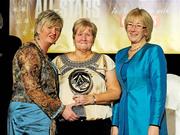 7 November 2009; Mary Herald, Antrim, Administrator of the Year, is presented with her Administrator of the year award by Joan O'Flynn, President of the Camogie Association, and Mary Hanafin T.D., Minister for Family and Social Affairs, during the 2009 Camogie All-Stars Awards, in association with O'Neills. Citywest Hotel, Conference, Leisure & Golf Resort, Dublin. Picture credit: Pat Murphy / SPORTSFILE