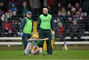 24 January 2016; Pat Camon, Offaly, after receiving treatment from Offaly physio Nicholas Lalor. Bord na Mona Walsh Cup, Semi-Final, Wexford v Offaly, Kennedy Park, New Ross, Co. Wexford. Picture credit: Sam Barnes / SPORTSFILE