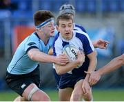 26 January 2016; Adam Larmour, St Andrew's College, is tackled by Jack Dunne, St Michael's College. Bank of Ireland Leinster Schools Senior Cup, 1st Round, St Andrew's College v St Michael's College, Donnybrook Stadium, Donnybrook, Dublin. Picture credit: Seb Daly / SPORTSFILE