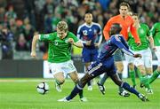14 November 2009; Kevin Doyle, Republic of Ireland, in action against Alou Diarra, France. FIFA 2010 World Cup Qualifying Play-off 1st Leg, Republic of Ireland v France, Croke Park, Dublin. Photo by Sportsfile