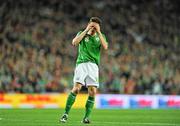 14 November 2009; Keith Andrew, Republic of Ireland, holds his head after watching his shot go wide. FIFA 2010 World Cup Qualifying Play-off 1st Leg, Republic of Ireland v France, Croke Park, Dublin. Picture credit: David Maher / SPORTSFILE