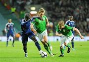 14 November 2009; Bacary Sagna, France, in action against Kevin Doyle, left, and Damien Duff, Republic of Ireland. FIFA 2010 World Cup Qualifying Play-off 1st Leg, Republic of Ireland v France, Croke Park, Dublin. Picture credit: Matt Browne / SPORTSFILE
