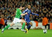 14 November 2009; Nicholas Anelka, France, in action against Sean St. Ledger, Republic of Ireland. FIFA 2010 World Cup Qualifying Play-off 1st Leg, Republic of Ireland v France, Croke Park, Dublin. Picture credit: Stephen McCarthy / SPORTSFILE