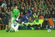 14 November 2009; Bacary Sagna, France, in action against Damien Duff, Republic of Ireland. FIFA 2010 World Cup Qualifying Play-off 1st Leg, Republic of Ireland v France, Croke Park, Dublin. Picture credit: Stephen McCarthy / SPORTSFILE
