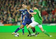 14 November 2009; theirry Henry, France, in action against Richard Dunne, left, and Keith Andrews, Republic of Ireland. FIFA 2010 World Cup Qualifying Play-off 1st Leg, Republic of Ireland v France, Croke Park, Dublin. Picture credit: Matt Browne / SPORTSFILE