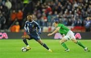 14 November 2009; Nicolas Anelka, France, in action against Keith Andrews, Republic of Ireland. FIFA 2010 World Cup Qualifying Play-off 1st Leg, Republic of Ireland v France, Croke Park, Dublin. Picture credit: Stephen McCarthy / SPORTSFILE