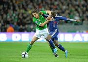 14 November 2009; Keith Andrews, Republic of Ireland, in action against Lassana Diarra, France. FIFA 2010 World Cup Qualifying Play-off 1st Leg, Republic of Ireland v France, Croke Park, Dublin. Picture credit: Stephen McCarthy / SPORTSFILE