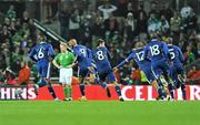 14 November 2009; Nicolas Anelka, second from left, France, celebrates after scoring his side's first goal with team-mates, as Damien Duff, Republic of Ireland looks on. FIFA 2010 World Cup Qualifying Play-off 1st Leg, Republic of Ireland v France, Croke Park, Dublin. Picture credit: David Maher / SPORTSFILE