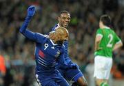 14 November 2009; Nicolas Anelka, France, celebrates with team-mate Eric Abidal, after scoring his side's first goal. FIFA 2010 World Cup Qualifying Play-off 1st Leg, Republic of Ireland v France, Croke Park, Dublin. Photo by Sportsfile