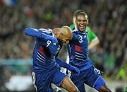 14 November 2009; Nicolas Anelka, France, celebrates with team-mate Eric Abidal, after scoring his side's first goal. FIFA 2010 World Cup Qualifying Play-off 1st Leg, Republic of Ireland v France, Croke Park, Dublin. Photo by Sportsfile