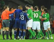 14 November 2009; Republic of Ireland and France players following the final whistle. FIFA 2010 World Cup Qualifying Play-off 1st Leg, Republic of Ireland v France, Croke Park, Dublin. Picture credit: Stephen McCarthy / SPORTSFILE