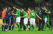 14 November 2009; Richard Dunne, Republic of Ireland, is restrained following the final whistle. FIFA 2010 World Cup Qualifying Play-off 1st Leg, Republic of Ireland v France, Croke Park, Dublin. Picture credit: Stephen McCarthy / SPORTSFILE