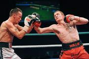 14 November 2009; Willie Casey in action against Michael O'Gara in round 5 of their Yanjing Fight Night Undercard Featherweight bout. University Sports Arena, Limerick. Picture credit: Diarmuid Greene / SPORTSFILE