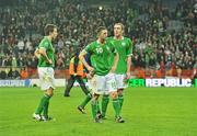 14 November 2009; Dejected Republic of Ireland players Sean St. Ledger, Robbie Keane and Richard Dunne, at the end of the game. FIFA 2010 World Cup Qualifying Play-off 1st Leg, Republic of Ireland v France, Croke Park, Dublin. Picture credit: David Maher / SPORTSFILE