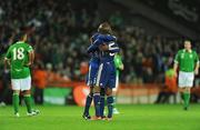 14 November 2009; William Gallas, 5, and Eric Abidal, France, celebrate after the final whistle. FIFA 2010 World Cup Qualifying Play-off 1st Leg, Republic of Ireland v France, Croke Park, Dublin. Picture credit: Stephen McCarthy / SPORTSFILE