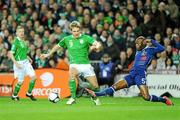 14 November 2009; Kevin Doyle, Republic of Ireland, in action against William Gallas, France. FIFA 2010 World Cup Qualifying Play-off 1st Leg, Republic of Ireland v France, Croke Park, Dublin. Photo by Sportsfile