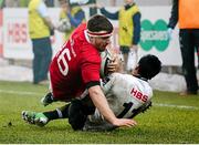 30 January 2016; Mike Sherry, Munster, is tackled by Diob Berryman, Zebre. Guinness PRO12, Round 13, Zebre v Munster, Stadio Sergio Lanfranchi, Parma, Italy. Picture credit: Roberto Bregani / SPORTSFILE