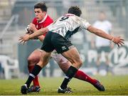 30 January 2016; Ian Keatley, Munster, is tackled by Luke Burgess, Zebre. Guinness PRO12, Round 13, Zebre v Munster, Stadio Sergio Lanfranchi, Parma, Italy. Picture credit: Roberto Bregani / SPORTSFILE