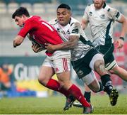 30 January 2016; Ian Keatley, Munster, is tackled by Kelly Haimona, Zebre. Guinness PRO12, Round 13, Zebre v Munster, Stadio Sergio Lanfranchi, Parma, Italy. Picture credit: Roberto Bregani / SPORTSFILE