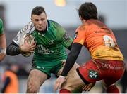 30 January 2016; Robbie Henshaw, Connacht, is tackled by Rhodri Williams, Scarlets. Guinness PRO12, Round 13, Connacht v Scarlets, Sportsground, Galway. Picture credit: Seb Daly / SPORTSFILE
