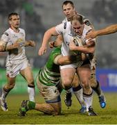 30 January 2016; Bronson Ross, Ulster, is tackled by Roberto Santamaria, Benetton Treviso. Guinness Pro 12, Round 13, Treviso v Ulster, Monigo Stadium, Treviso, Italy. Picture credit: Max Pratelli / SPORTSFILE