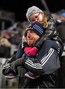 30 January 2016; Dublin supporters Sarah Kendellen, age six, from Marino, relaxes on her dad, Tom's shoulders, during the half time break. Some 30,107 patrons attended the game.  Allianz Football League, Division 1, Round 1, Dublin v Kerry, Croke Park, Dublin. Picture credit: Ray McManus / SPORTSFILE