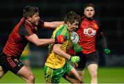 30 January 2016; Michael Carroll, Donegal, in action against Peter Turley, Down. Allianz League, Division 1, Round 1, Down v Donegal, Páirc Esler, Newry, Co. Down. Picture credit: Oliver McVeigh / SPORTSFILE