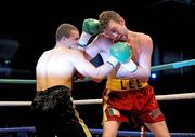 14 November 2009; Andy Lee, right, in action against Affif Belghecham in round 10 of their Yanjing Fight Night International Middleweight bout. University Sports Arena, Limerick. Picture credit: Diarmuid Greene / SPORTSFILE