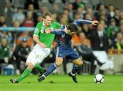 14 November 2009; Yoann Gourcuff, France, in action against Glenn Whelan, Republic of Ireland. FIFA 2010 World Cup Qualifying Play-off 1st Leg, Republic of Ireland v France, Croke Park, Dublin. Picture credit: Stephen McCarthy / SPORTSFILE