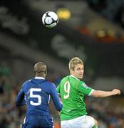 14 November 2009; Kevin Doyle, Republic of Ireland, in action against William Gallas, France. FIFA 2010 World Cup Qualifying Play-off 1st Leg, Republic of Ireland v France, Croke Park, Dublin. Picture credit: Stephen McCarthy / SPORTSFILE