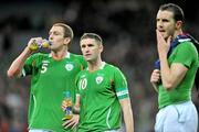 14 November 2009; Robbie Keane, centre, Republic of Ireland captain with Richard Dunne and John O'Shea, at the end of the game. FIFA 2010 World Cup Qualifying Play-off 1st Leg, Republic of Ireland v France, Croke Park, Dublin. Picture credit: David Maher / SPORTSFILE
