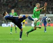 14 November 2009; Liam Lawrence, Republic of Ireland, in action against Andre-Pierre Gignac, France. FIFA 2010 World Cup Qualifying Play-off 1st Leg, Republic of Ireland v France, Croke Park, Dublin. Picture credit: Matt Browne / SPORTSFILE