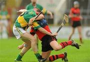 15 November 2009; Conor Fitzgerald, Adare, in action against Sean O'Riordan, Newtownshandrum. AIB GAA Hurling Munster Senior Club Championship Semi-Final, Newtownshandrum v Adare, Páirc Uí Chaoimh, Cork. Picture credit: Pat Murphy / SPORTSFILE