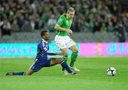 14 November 2009; Liam Lawrence, Republic of Ireland, in action against Patrice Evra, France. FIFA 2010 World Cup Qualifying Play-off 1st Leg, Republic of Ireland v France, Croke Park, Dublin. Photo by Sportsfile