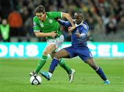 14 November 2009; Keith Andrews, Republic of Ireland, in action against Lassana Diarra, France. FIFA 2010 World Cup Qualifying Play-off 1st Leg, Republic of Ireland v France, Croke Park, Dublin. Photo by Sportsfile