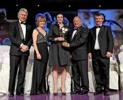 14 November 2009; Cliodhna O'Connor of Dublin is presented with her All-Star award by Pat Quill, President, Cumann Peil Gael na mBan, in the company of, from left, Tony Towell, O'Neills, Mary Davis, Managing Director, Special Olympics Europe / Eurasia and Pol O Gallchoir, Ceannsai, TG4. TG4 O'Neill's Ladies Football All-Star Awards 2009, Citywest Hotel, Conference, Leisure and Golf Resort, Dublin. Picture credit: Brendan Moran / SPORTSFILE