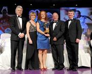 14 November 2009; Noelle Tierney of Mayo is presented with her All-Star award by Pat Quill, President, Cumann Peil Gael na mBan, in the company of, from left, Tony Towell, O'Neills, Mary Davis, Managing Director, Special Olympics Europe / Eurasia and Pol O Gallchoir, Ceannsai, TG4. TG4 O'Neill's Ladies Football All-Star Awards 2009, Citywest Hotel, Conference, Leisure and Golf Resort, Dublin. Picture credit: Brendan Moran / SPORTSFILE