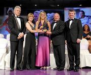 14 November 2009; Angela Walsh of Cork is presented with her All-Star award by Pat Quill, President, Cumann Peil Gael na mBan, in the company of, from left, Tony Towell, O'Neills, Mary Davis, Managing Director, Special Olympics Europe / Eurasia and Pol O Gallchoir, Ceannsai, TG4. TG4 O'Neill's Ladies Football All-Star Awards 2009, Citywest Hotel, Conference, Leisure and Golf Resort, Dublin. Picture credit: Brendan Moran / SPORTSFILE