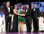 14 November 2009; Geraldine O'Flynn of Cork is presented with her All-Star award by Pat Quill, President, Cumann Peil Gael na mBan, in the company of, from left, Tony Towell, O'Neills, Mary Davis, Managing Director, Special Olympics Europe / Eurasia and Pol O Gallchoir, Ceannsai, TG4. TG4 O'Neill's Ladies Football All-Star Awards 2009, Citywest Hotel, Conference, Leisure and Golf Resort, Dublin. Picture credit: Brendan Moran / SPORTSFILE