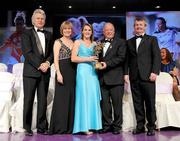 14 November 2009; Briege Corkery of Cork is presented with herAll-Star award by Pat Quill, President, Cumann Peil Gael na mBan, in the company of, from left, Tony Towell, O'Neills, Mary Davis, Managing Director, Special Olympics Europe / Eurasia and Pol O Gallchoir, Ceannsai, TG4. TG4 O'Neill's Ladies Football All-Star Awards 2009, Citywest Hotel, Conference, Leisure and Golf Resort, Dublin. Picture credit: Brendan Moran / SPORTSFILE