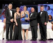 14 November 2009; Juliet Murphy of Cork is presented with her All-Star award by Pat Quill, President, Cumann Peil Gael na mBan, in the company of, from left, Tony Towell, O'Neills, Mary Davis, Managing Director, Special Olympics Europe / Eurasia and Pol O Gallchoir, Ceannsai, TG4. TG4 O'Neill's Ladies Football All-Star Awards 2009, Citywest Hotel, Conference, Leisure and Golf Resort, Dublin. Picture credit: Brendan Moran / SPORTSFILE