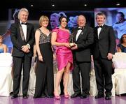 14 November 2009; Noelle Earley of Kildare is presented with her All-Star award by Pat Quill, President, Cumann Peil Gael na mBan, in the company of, from left, Tony Towell, O'Neills, Mary Davis, Managing Director, Special Olympics Europe / Eurasia and Pol O Gallchoir, Ceannsai, TG4. TG4 O'Neill's Ladies Football All-Star Awards 2009, Citywest Hotel, Conference, Leisure and Golf Resort, Dublin. Picture credit: Brendan Moran / SPORTSFILE