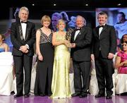 14 November 2009; Ciara McAnespie of Monaghan is presented with her All-Star award by Pat Quill, President, Cumann Peil Gael na mBan, in the company of, from left, Tony Towell, O'Neills, Mary Davis, Managing Director, Special Olympics Europe / Eurasia and Pol O Gallchoir, Ceannsai, TG4. TG4 O'Neill's Ladies Football All-Star Awards 2009, Citywest Hotel, Conference, Leisure and Golf Resort, Dublin. Picture credit: Brendan Moran / SPORTSFILE