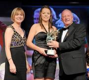 14 November 2009; Niamh O'Dea of Clare is presented with the Munster Young Player of the Year by Pat Quill, President, Cumann Peil Gael na mBan, in the company of Mary Davis, Managing Director, Special Olympics Europe / Eurasia. TG4 O'Neill's Ladies Football All-Star Awards 2009, Citywest Hotel, Conference, Leisure and Golf Resort, Dublin. Picture credit: Brendan Moran / SPORTSFILE