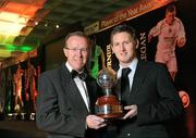 15 November 2009; Gary Twigg of Shamrock Rovers is presented with the PFAI Ford Premier Division Player of the Year 2009 by Eddie Murphy, Managing Director, Ford Ireland. PFAI Ford Awards 2009, The Burlington Hotel, Dublin. Picture credit: Brendan Moran / SPORTSFILE